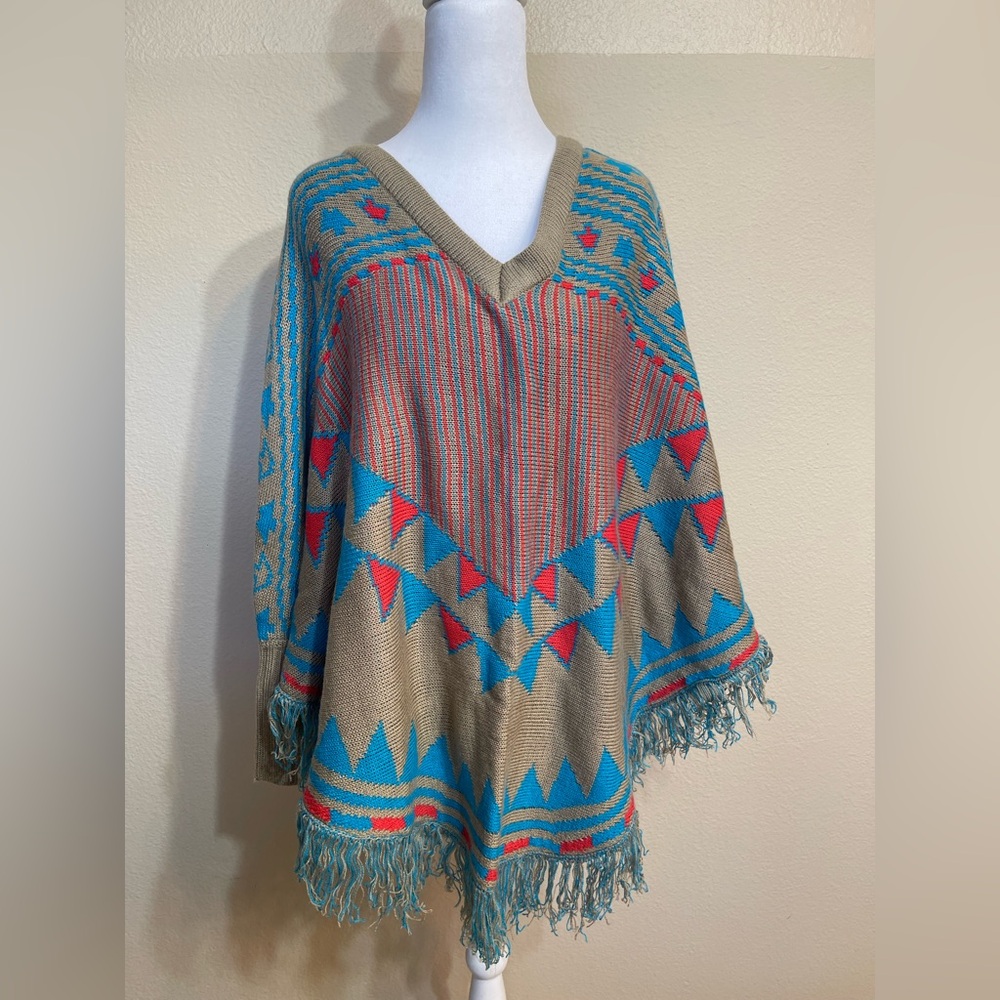 Rue21 Geometric Patterned Western Inspired poncho with sleeve and  Fringe